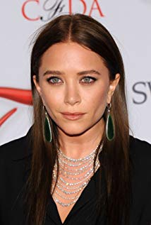 How tall is Mary Kate Olsen?